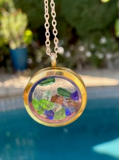 Gold sea glass locket necklace