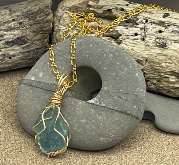 Turquoise sea glass necklace with gold wire wrap