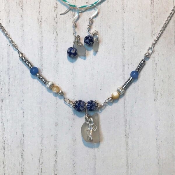 Blue and white necklace and earrings set