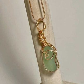 Light sea foam with gold wire wrap