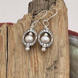 Framed pearl earrings