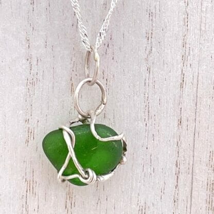 Green sea glass in silver necklace