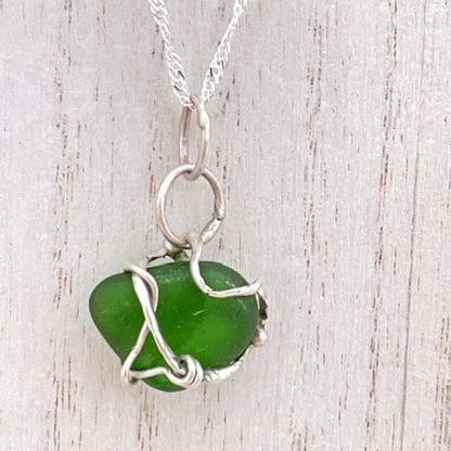 Green sea glass in silver necklace