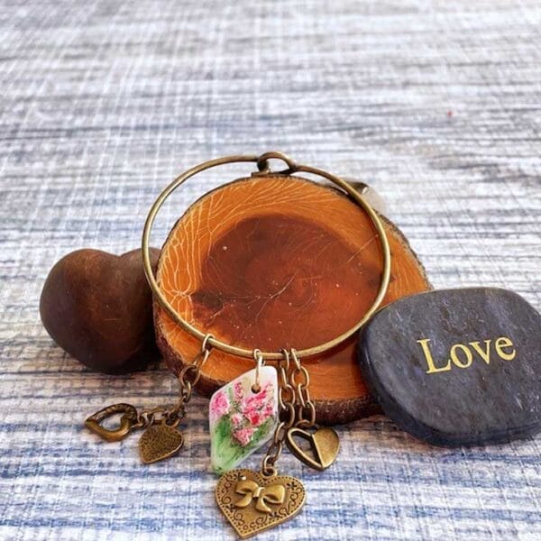 Antique gold bangle w pottery