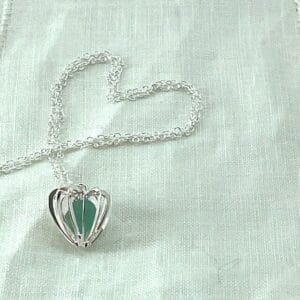 Caged heart sea glass necklace