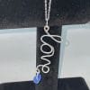 silver love necklace vertical