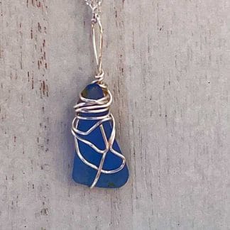 Blue sea glass necklace with silver wire