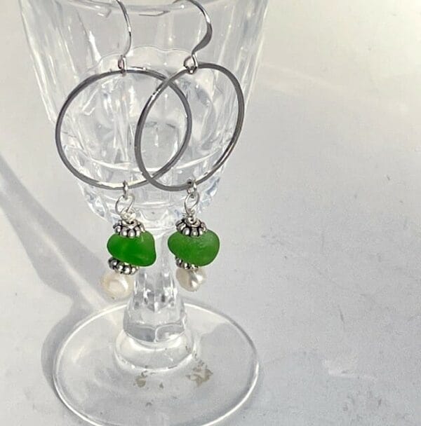 Green sea glass earrings with pearls