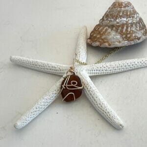 Brown sea glass necklace in gold