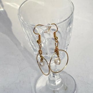 Pearls in gold circle earrings