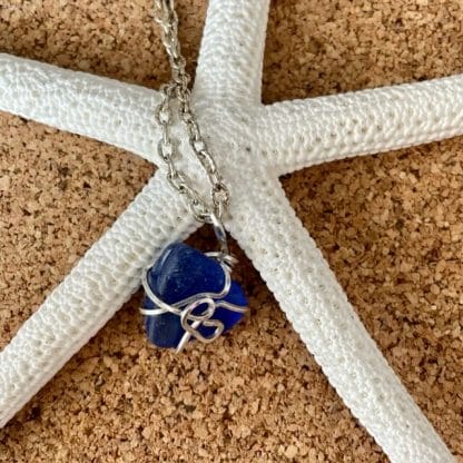 Blue sea glass silver wire wrap necklace
