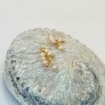 Dangling pearl earrings, view