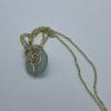 Sea foam colored sea glass necklace gold wire wrap