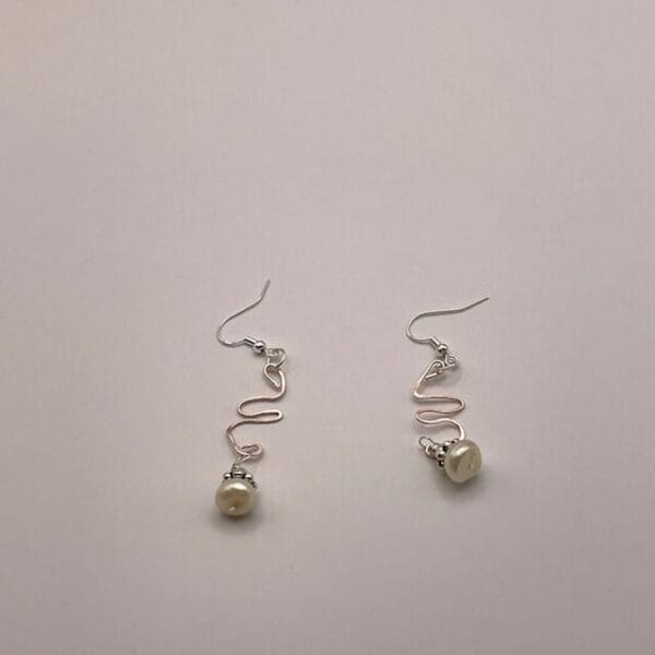 Button pearl dangling earrings