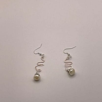 Button pearl dangling earrings