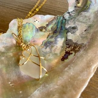 White sea glass necklace in gold