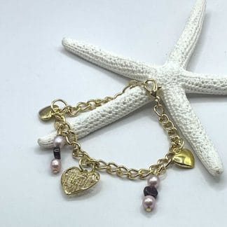 Gold heart bracelet with pearls and garnet
