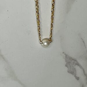 Pearaal necklace on gold chain