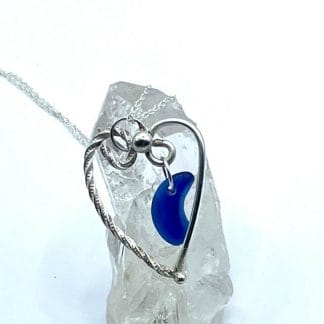 Sterling silver heart with blue sea glass, view