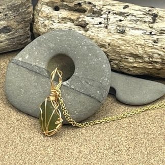 Light green gold wire wrap sea glass necklace