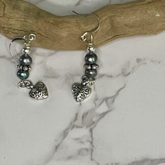 Peacock pearl earrings with silver heart