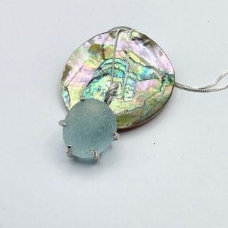 Sterling silver prong pendant with aqua sea glass