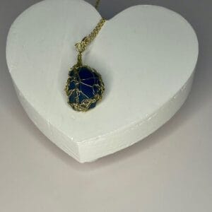 Blue sea glass crocheted necklace on heart