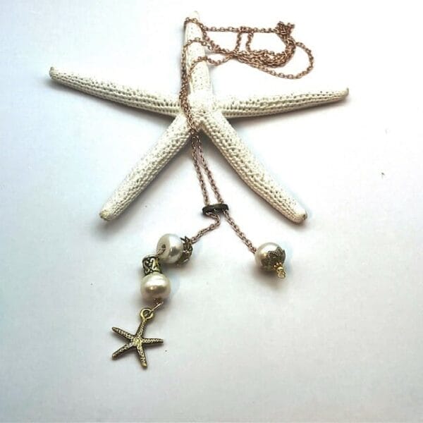 Pearl lariat with gold chain & starfish