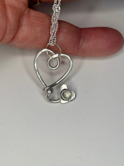 Sterling silver heart with moonstone necklace,closeup