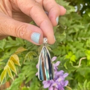 Surfite Sterling Silver pendant, outdoors