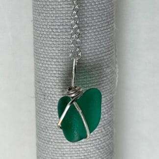 Dark teal heart sea glass necklace, close up