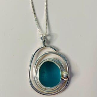 Teal spiral sea glass pendant