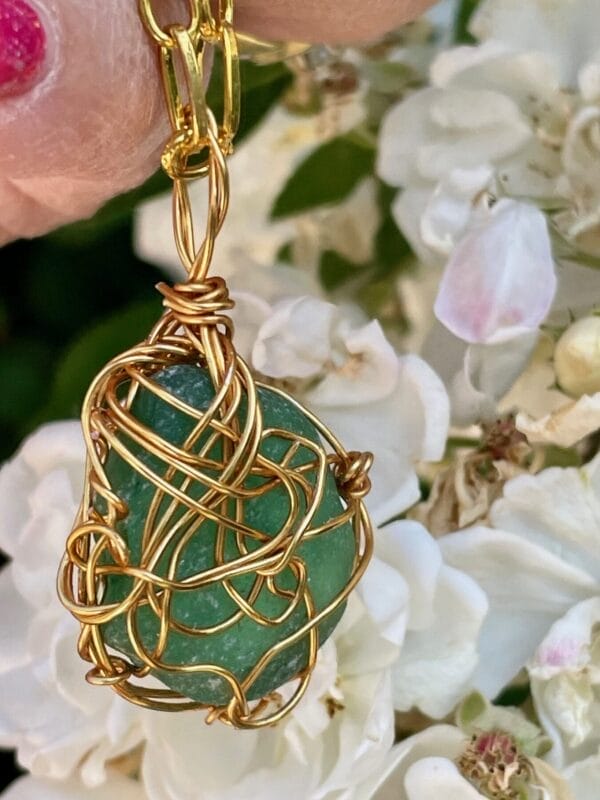 Teal green sea glass necklace woven gold wire