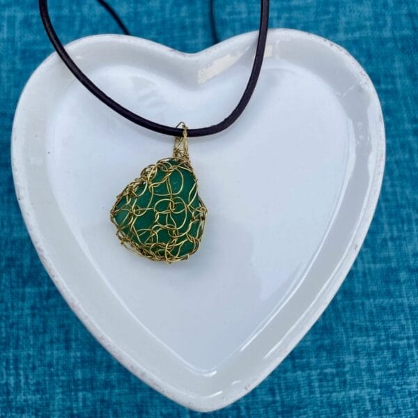 Teal sea glass gold crochet necklace on leather