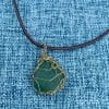 Teal sea glass gold crochet necklace, reverse