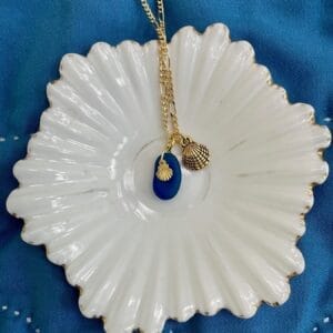 Blue sea glass necklace with gold scallops