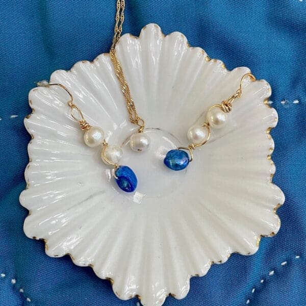 Blue and white pearl necklace and earring set