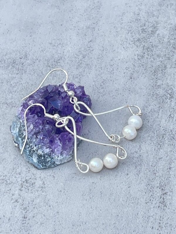 Silver Dangle Earrings with Pearls , close up