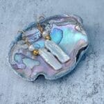 Biwa pearl earrings, on abalone