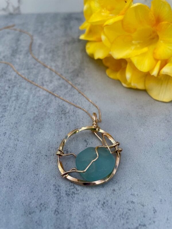 Gold wave necklace with teal sea glass necklace,