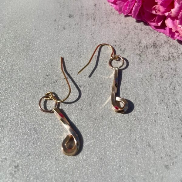 Gold twisted dangling earrings